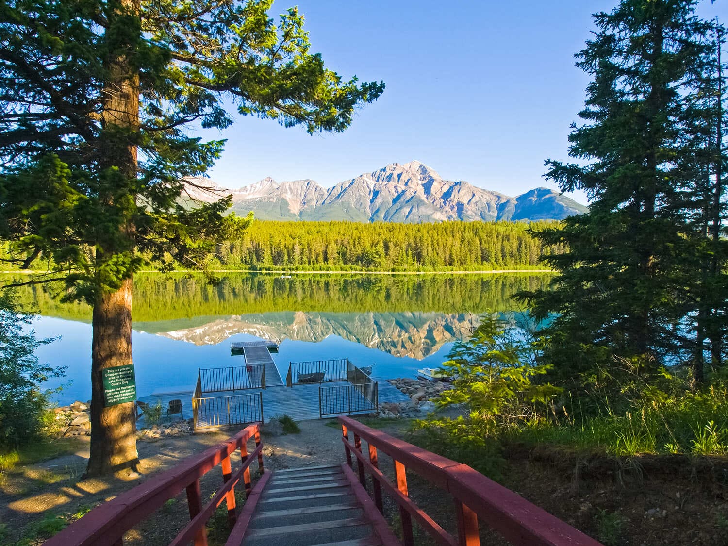 Pier at the lake in the taiga forest in Sweden - Countries With The Best Mental Healthcare In The World