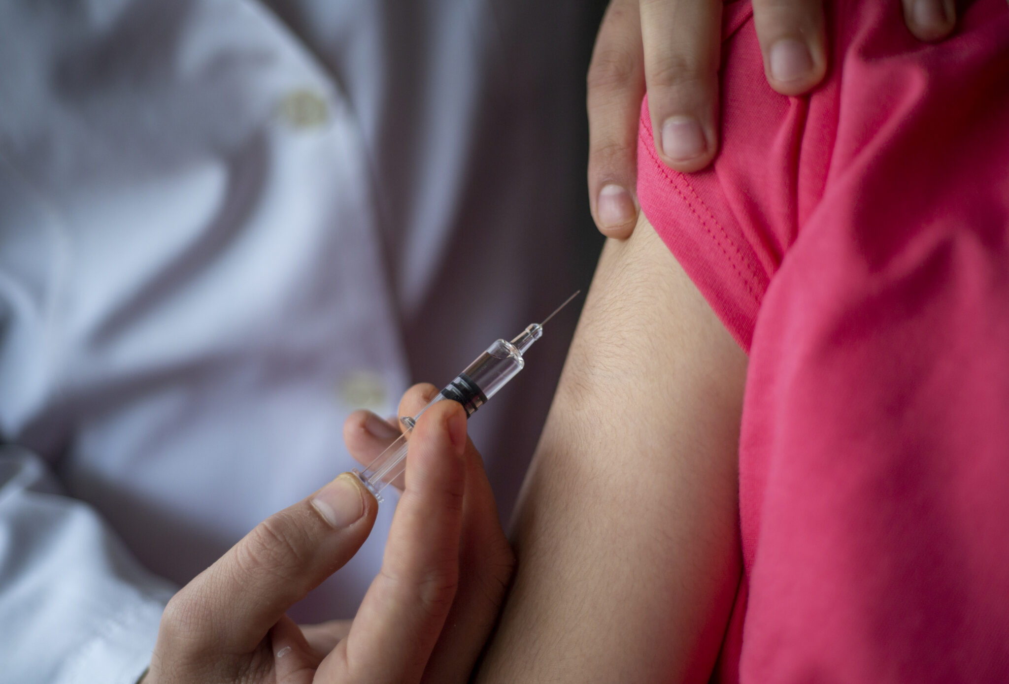 William Russell Blog - Guide on vaccinations for expat children - banner close up of needle about to go in arm