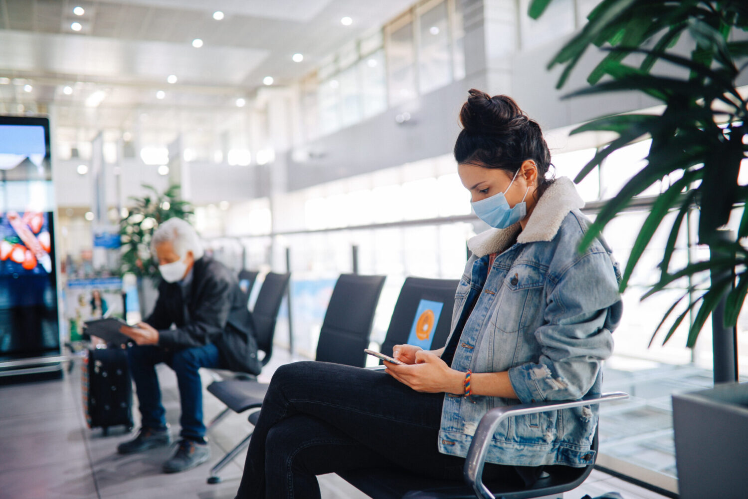 William-Russell-Blog-Will-Expats-Need-Covid-Vaccine-Passports-to-Move-and-Live-Abroad-People at the airport waiting within social distance